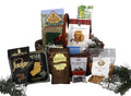Holiday gift basket filled with assorted packaged snacks and baking mixes