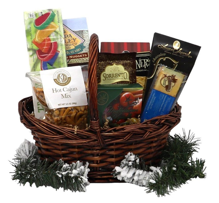 Holiday gift basket in a wicker basket with assorted snack bags and mixes
