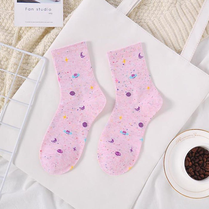 Pink galaxy print crew socks with small planets and stars