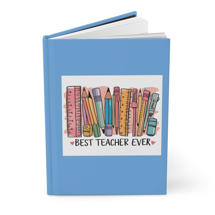 Blue hardcover journal with open pages and pencil graphic front