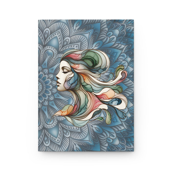 Matte hardcover journal with blue mandala cover and profile woman illustration