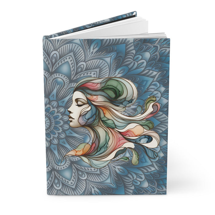 Matte hardcover journal standing with colorful profile woman art on blue mandala cover