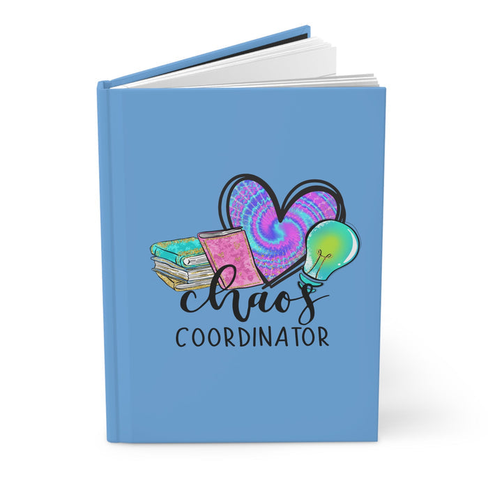 Blue matte hardcover journal with heart artwork and 'Chaos Coordinator' on cover