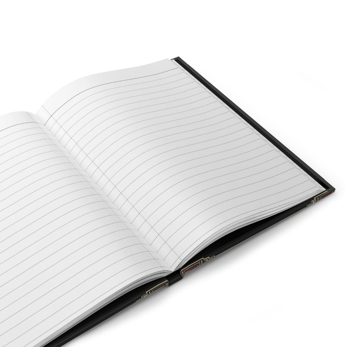 Hardcover journal open to lined pages with black cover edge and ribbon bookmark