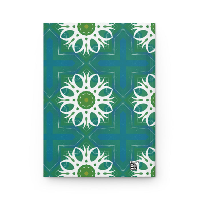 Hardcover journal with teal-green cover, white ornamental sunburst pattern, barcode sticker