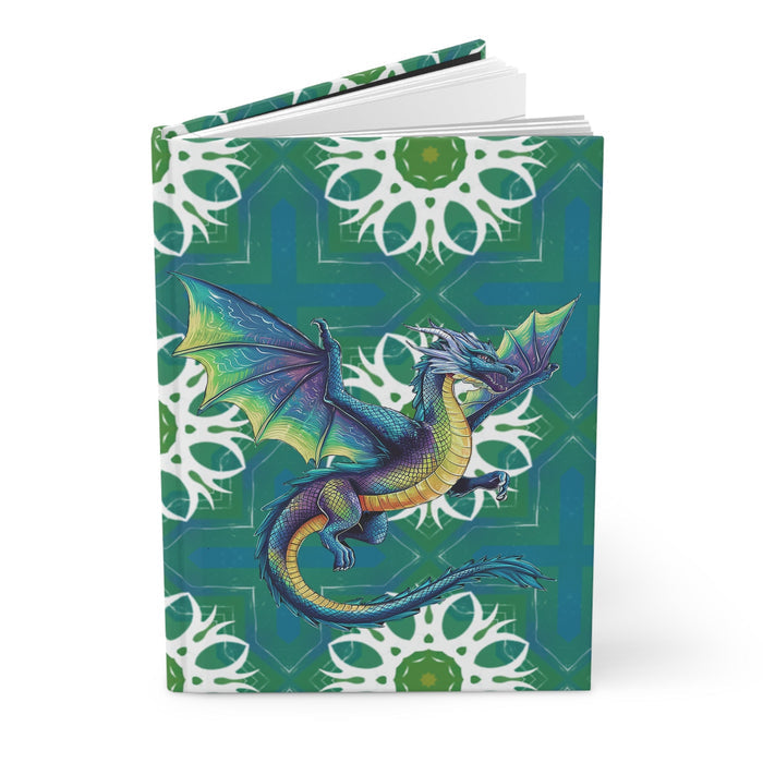 Hardcover journal with electric dragon artwork on teal-green matte cover, standing view