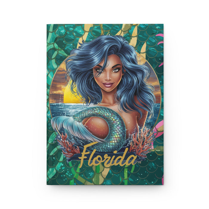 Hardcover matte journal with teal-blue mermaid illustration and Florida wordmark