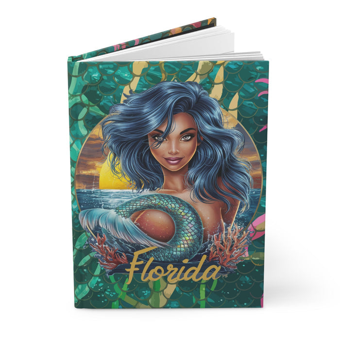 Hardcover matte journal with teal mermaid cover art and Florida title