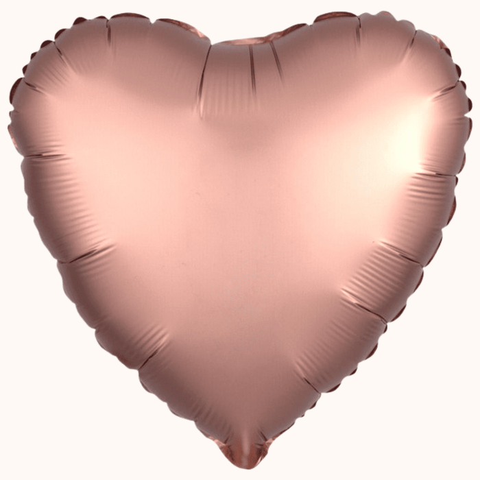 Rose gold heart balloon, shiny metallic sheen, single balloon close-up