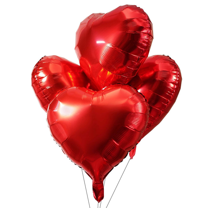 Red heart balloon cluster with three hearts and tied strings