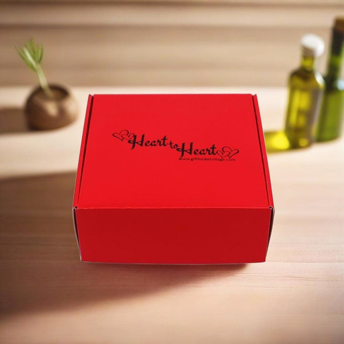 Red gift box with Heart to Heart logo on lid