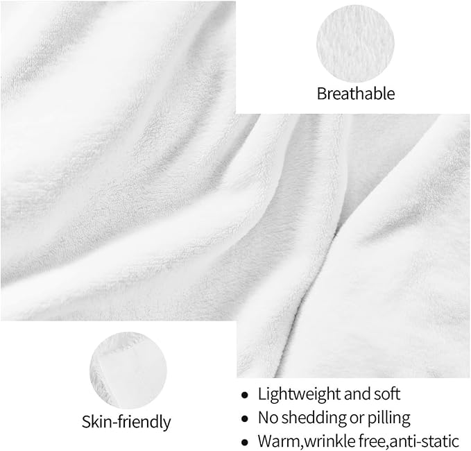 White fleece throw blanket close-up with soft, fluffy textured surface