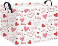 Pink rectangular valentines gift basket with heart and Love print, black carry handles