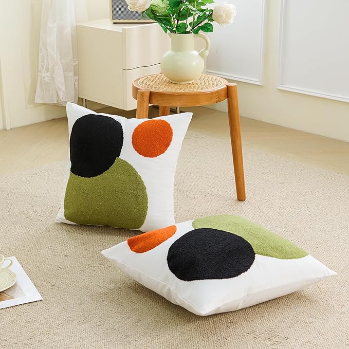 Tufted boho pillow covers with black, olive, and orange circle pattern