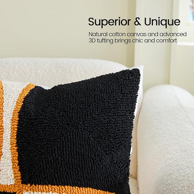 Square tufted dark pillow cover corner with orange lattice pattern and textured surface