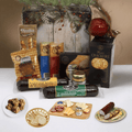 Holiday gift box with assorted snacks, crackers, and sausage arranged on a tray