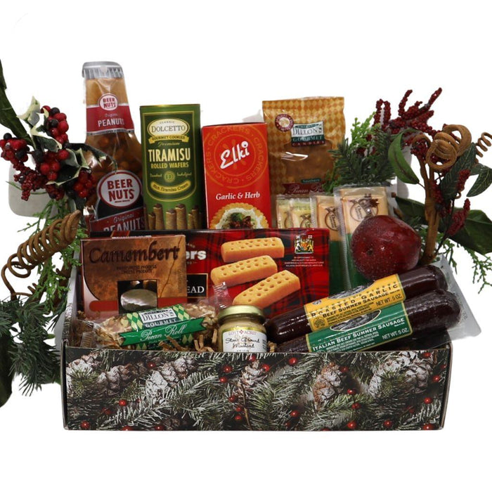 Holiday gift box with festive pine decor and assorted packaged snacks and cheese