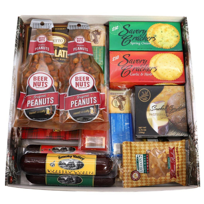 Holiday gift box interior with peanut bags, cheese crackers, sausages and savory snacks