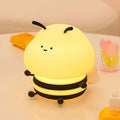 Honey bee night light, yellow face with smiling eyes and three stacked glow bands
