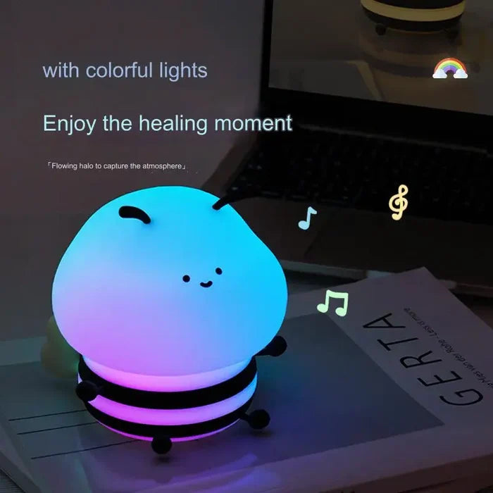 Honey bee night light with color-changing purple and blue glow and three stacked bands