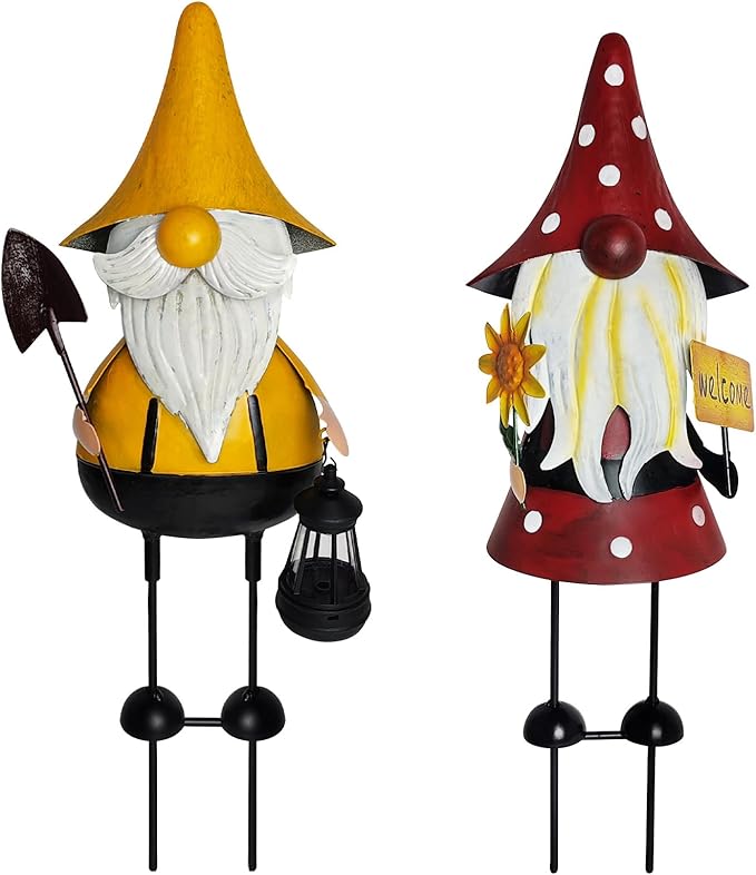 Metal gnome yard statues: yellow-hat and red-hat with white beards, black boots