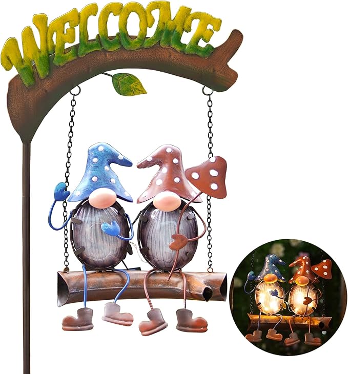 Solar gnome swing yard decoration with glowing blue and pink gnomes under Welcome arch