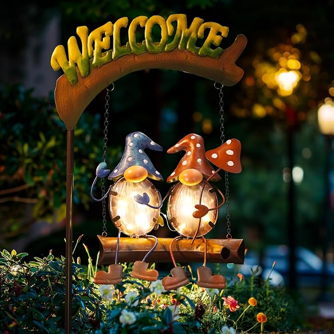 Outdoor solar gnome swing lights with glowing bulb bodies and Welcome arch