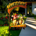 Solar swing garden light with 3D rabbits on chains under a brown welcome arch sign