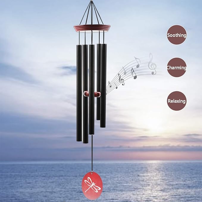 Outdoor wind chime with five black tubes and red dragonfly disc, hanging from red cap.