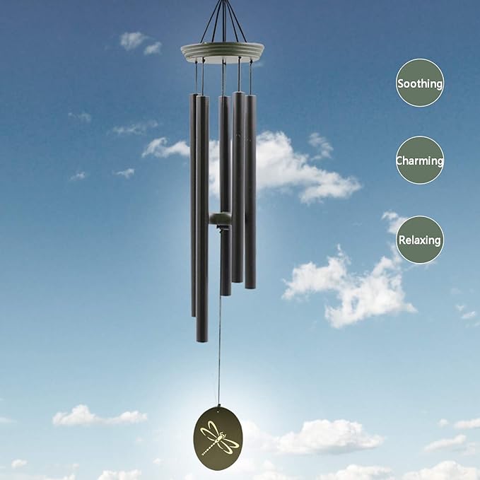 Outdoor wind chime with dark metal tubes and a green dragonfly oval hanging charm