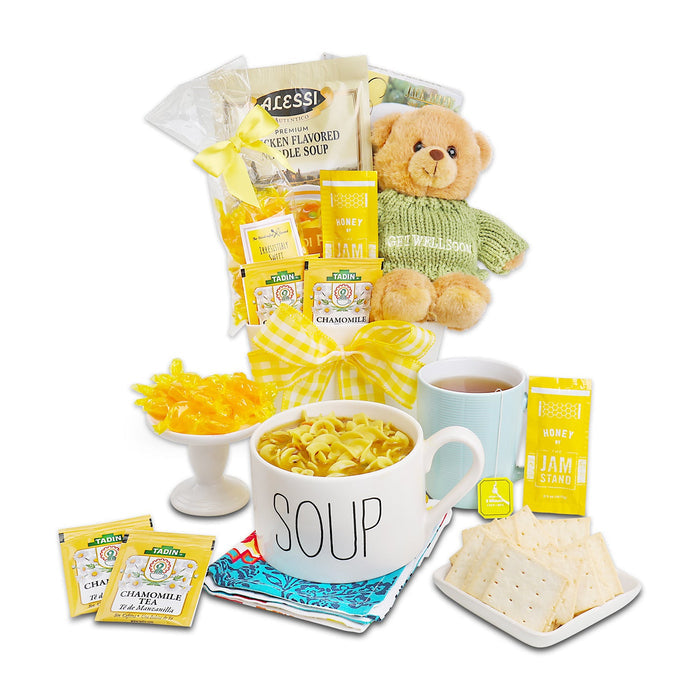 Soup gift basket with teddy bear in green sweater, yellow ribbon, mug, soup and tea packets