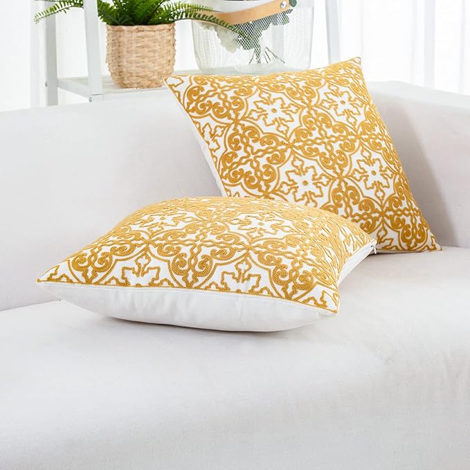 Mustard yellow and white embroidered throw pillow cover set with damask pattern