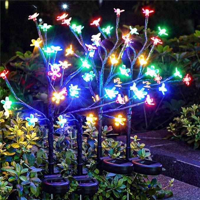 Solar flower string lights with multicolor LED butterflies on black branching stakes