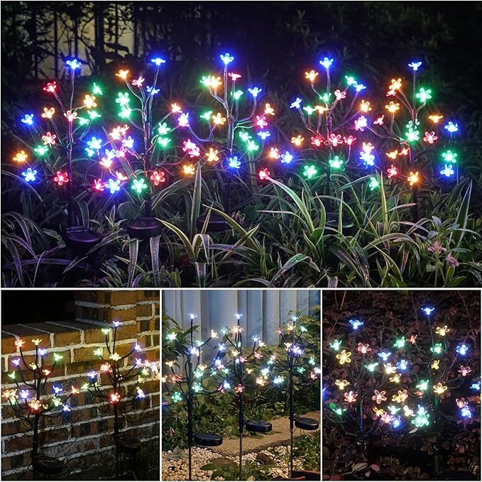 Solar butterfly garden lights spreading multicolor LEDs across many black branching stakes