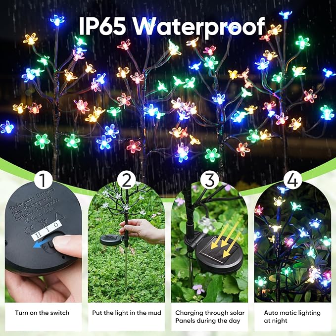 Solar garden flower fairy lights set with multicolor LED blossoms on ground stakes