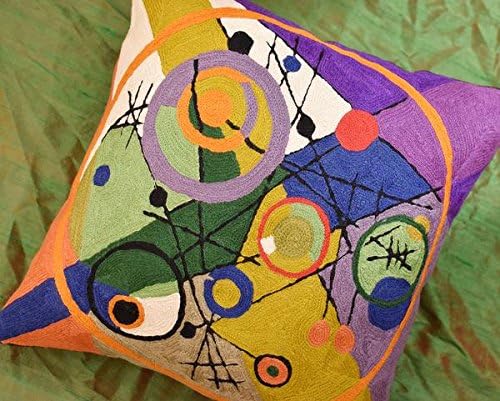 Multicolor abstract circle embroidered pillow cover with orange, purple, and blue accents