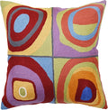 Square pillow cover with abstract concentric circles in red, blue, purple, green