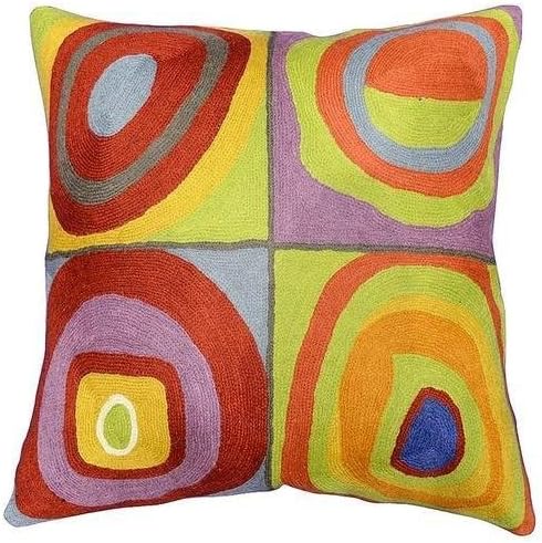 Square pillow cover with four-panel abstract circles in red, blue, purple, and green