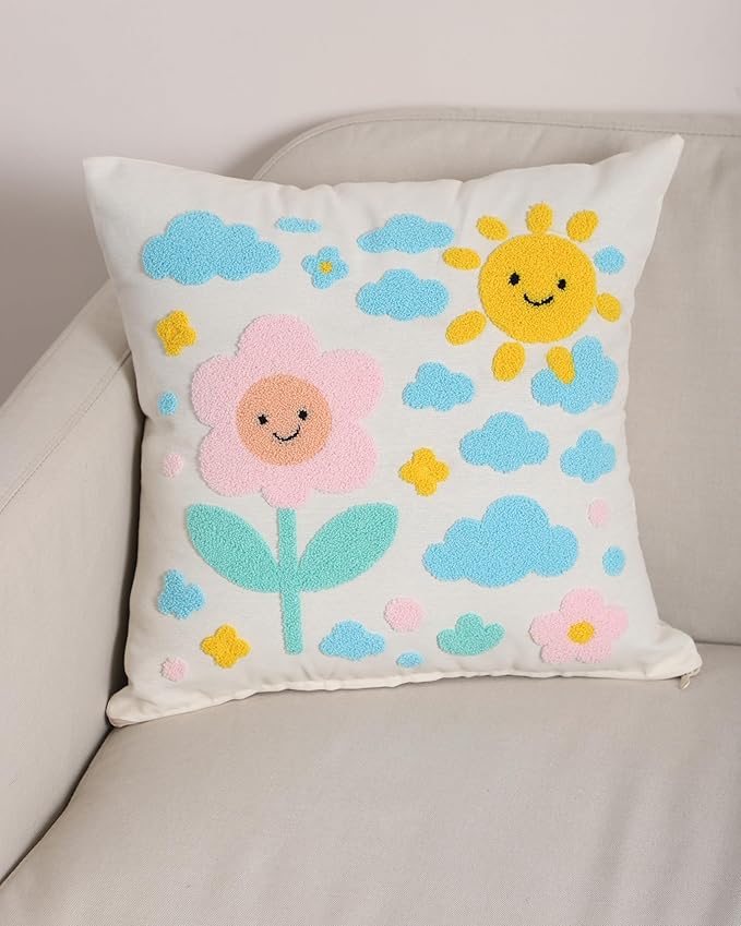 Handmade cotton throw pillow cover featuring a smiling sun, pink flower, and clouds