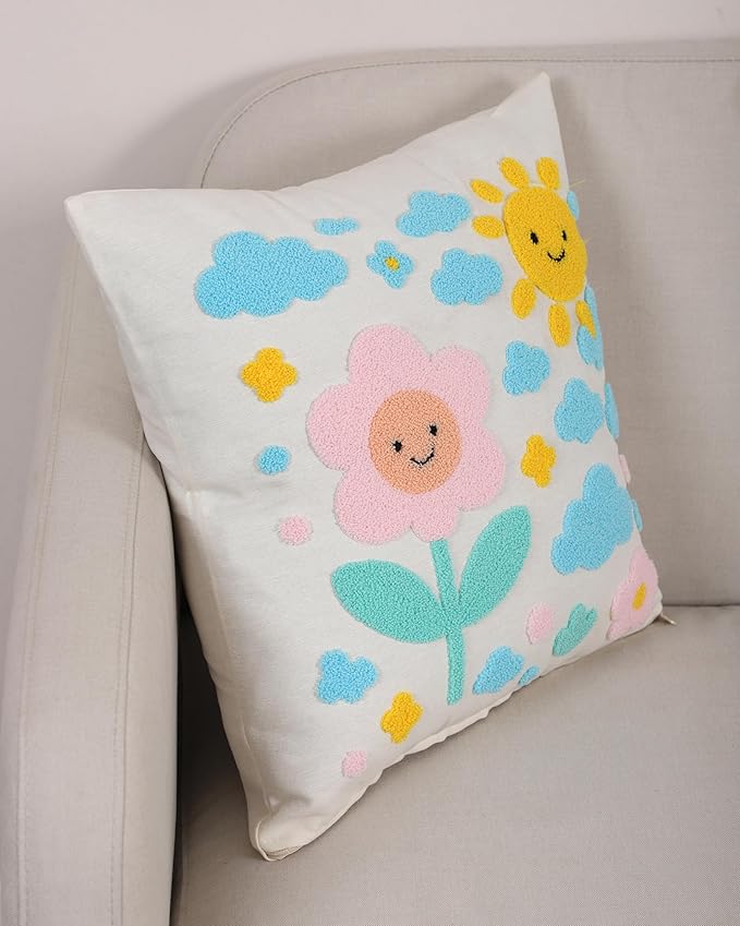 Handmade cotton throw pillow cover with smiling sun, pink flower, and blue cloud accents