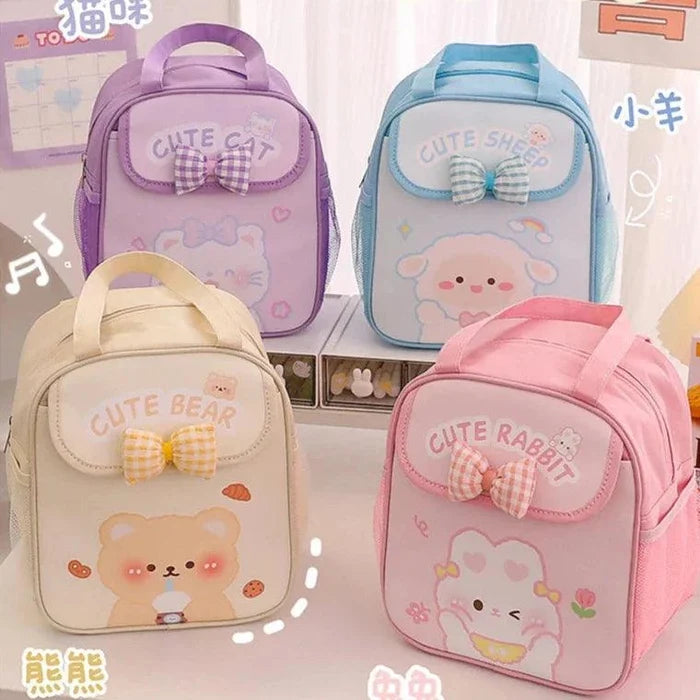 Kawaii insulated animal lunch bag set, showing purple, blue, cream and pink designs