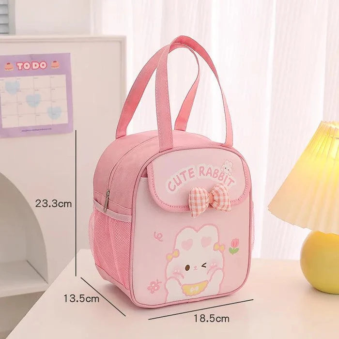 Pink insulated animal lunch bag with bow front pocket and carry handle, size diagram shown