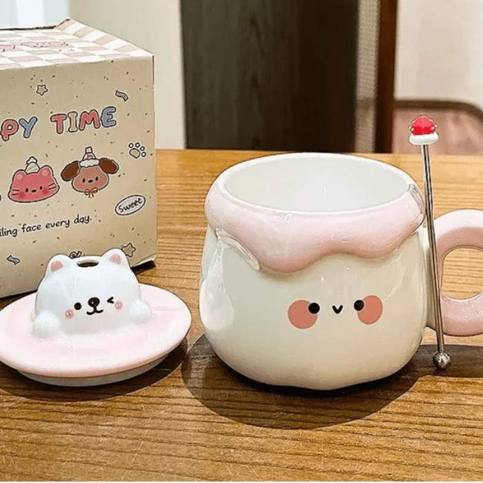 Ceramic cat pudding mug with pink lid, strawberry topper, and cute face on body