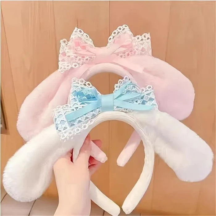 Bunny ears headband in pink and blue, with lace bows and plush ear covers