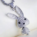 Rhinestone bunny pendant necklace with silver-tone chain and rabbit face with dangling tail