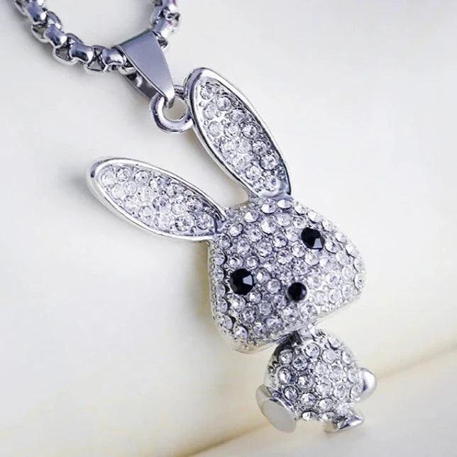 Rhinestone bunny pendant necklace with silver-tone chain and rabbit face with dangling tail