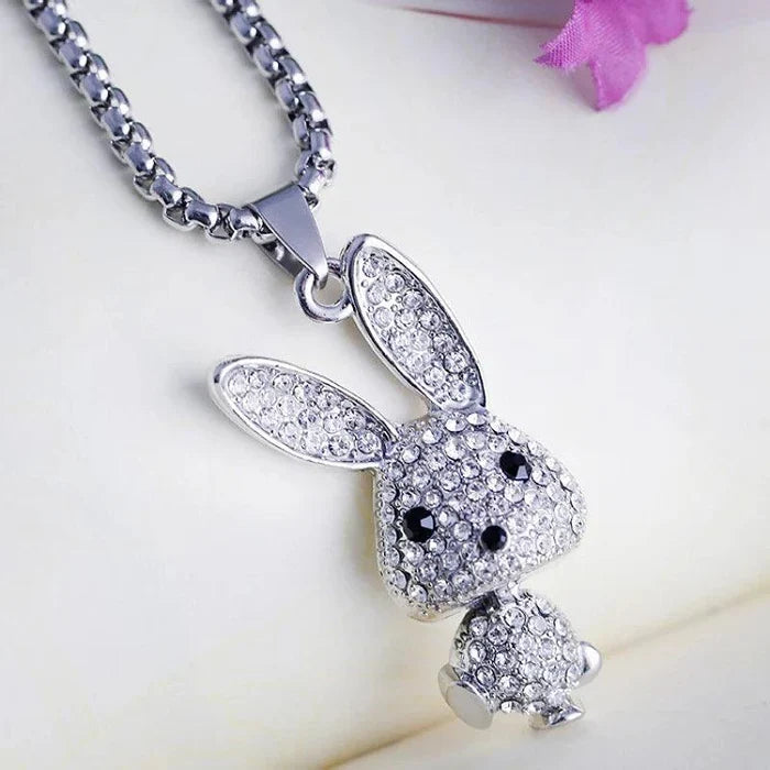Rhinestone bunny pendant necklace with silver-tone chain and rabbit head and tail charms