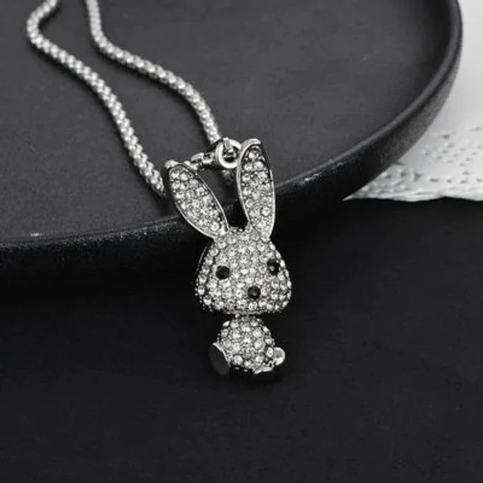 Rhinestone bunny pendant necklace with silver-tone chain and bunny head and tail charms