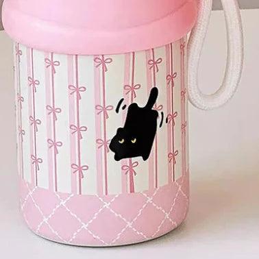 Pink thermos bottle with cute black cat and bow stripe design