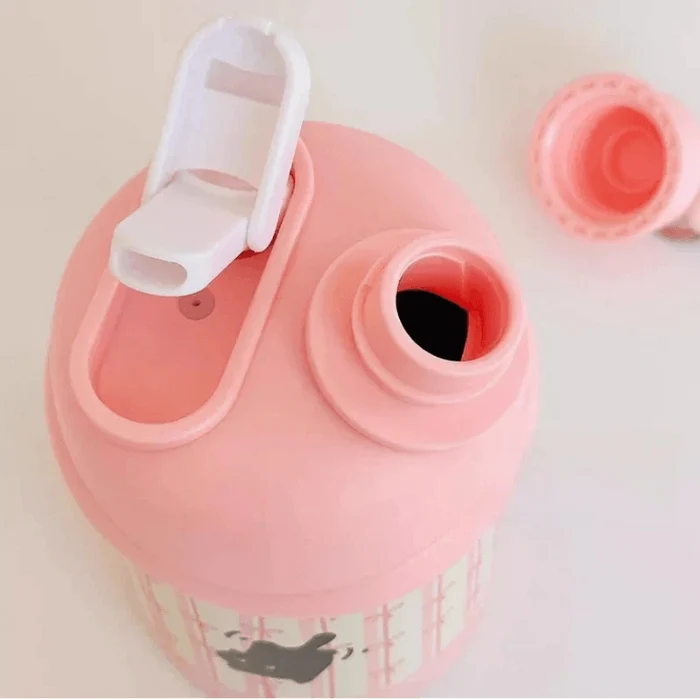 Pink thermos bottle with flip straw lid and black cat graphic